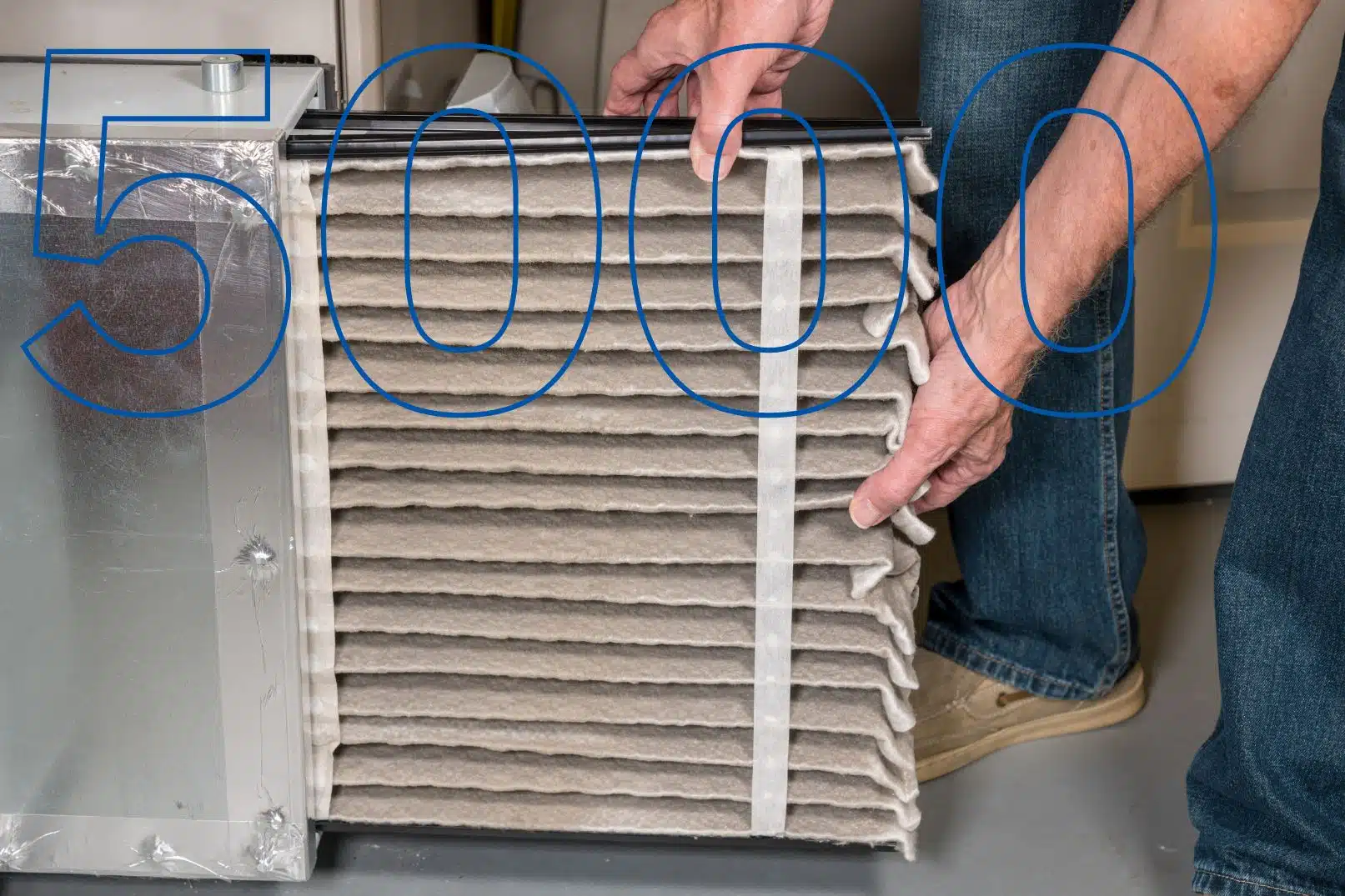 a person is holding air filter
